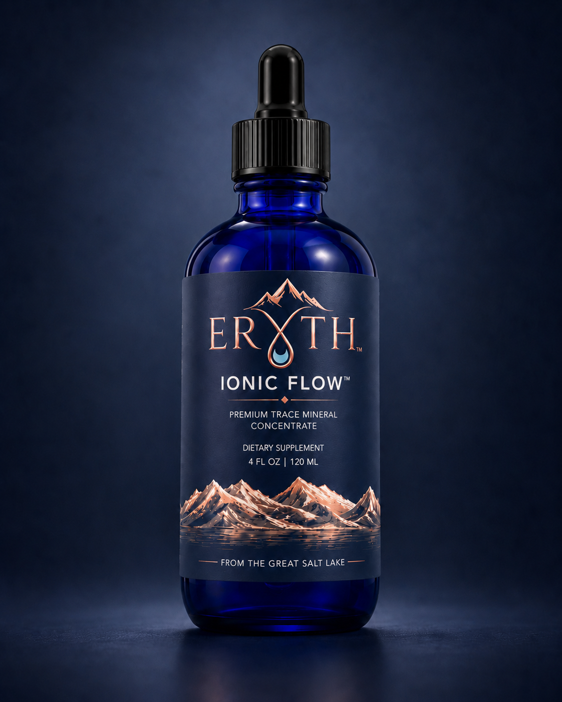 Ionic Flow ERYTH Ionic Flow cobalt blue glass bottle of liquid trace minerals on a deep navy background.